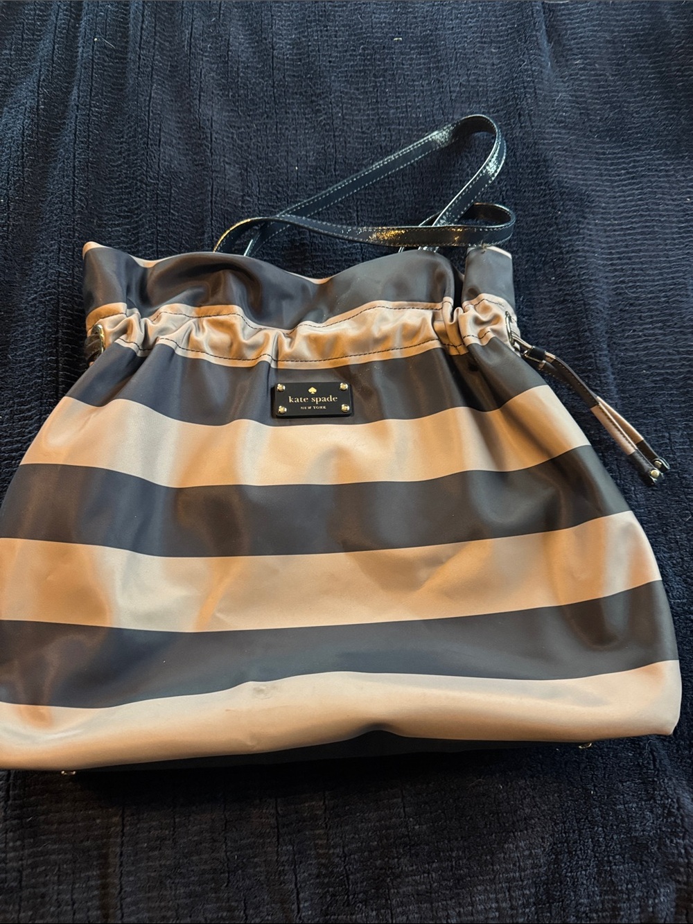 kate spade Black and Cream Striped Drawstring Shoulder Bag